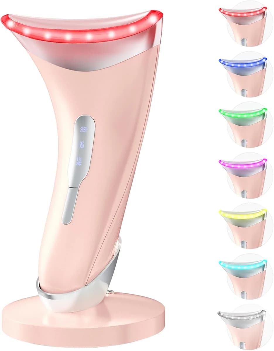 LED face and neck massager in glossy pink with charging stand