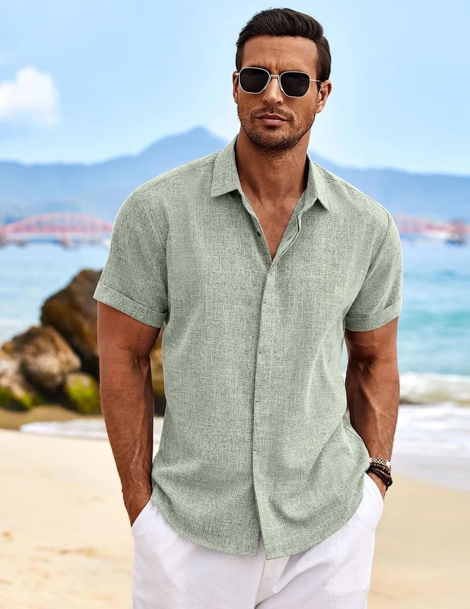 man wearing a linen shirt at the beach