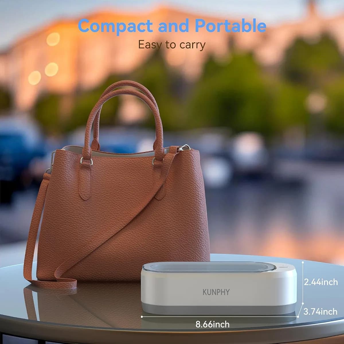 compact ultrasonic jewelry cleaner by a handbag