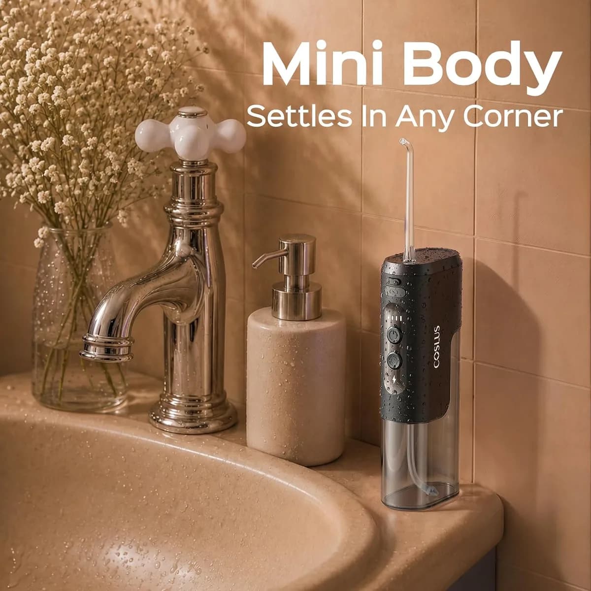 mini travel water flosser on a bathroom counter