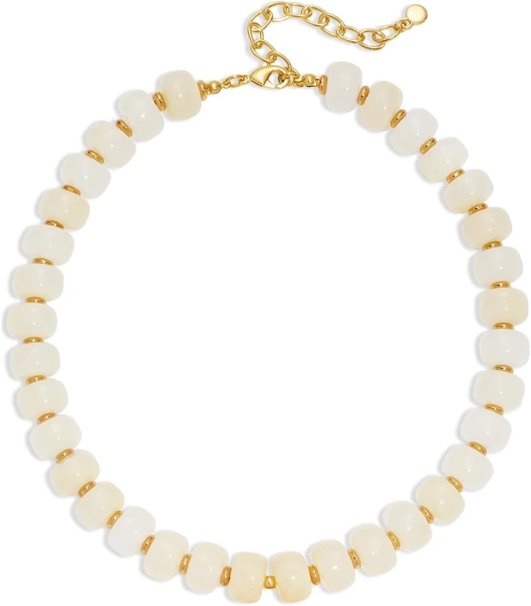 white chunky beaded necklace with gold accents